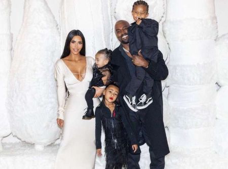 Kanye West with his wife and children 
